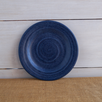 Handcrafted salad plate in a denim hue